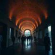 Editorial photograph inside Japan’s former Nara Prison after adaptive reuse, showing a preserved radial corridor.
