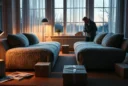 Editorial photograph of a Scandinavian living room at dusk, centered on two nearly identical teddy-fleece sofa.