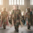 Editorial concept photograph exploring the concealment and collective movement of Nick Cave’s Soundsuits: three performers.