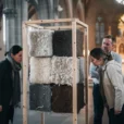 Editorial photograph illustrating waste-wool cladding research during the Oslo Architecture Triennale: an independent timber display frame.