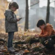 Editorial photograph exploring the premise of Freckle’s AI-powered children’s phone: two children around nine years old.