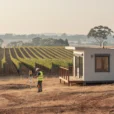 Editorial photograph illustrating a relocatable dwelling in a New South Wales vineyard, Australia: a modest contemporary.