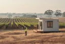 Editorial photograph illustrating a relocatable dwelling in a New South Wales vineyard, Australia: a modest contemporary.