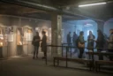 Editorial photograph inside a repurposed basement beneath a former East Berlin power station, evoking a techno-history.