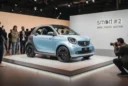 Editorial photograph of the Smart #2 EV on display at the 2026 Paris Motor Show, using.