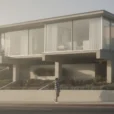 Editorial photograph from a public sidewalk in Newport Beach, California, looking toward an early modernist coastal.