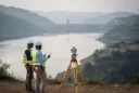 Editorial photograph from an accessible hillside overlooking a vast hydropower reservoir in western Ethiopia’s Blue Nile.